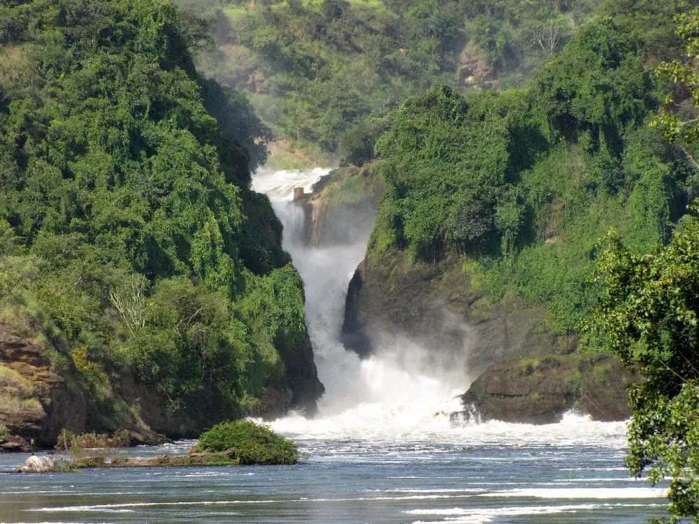 The massive volume of the Victoria Nile churning through a narrow stone gap at Murchison Falls
